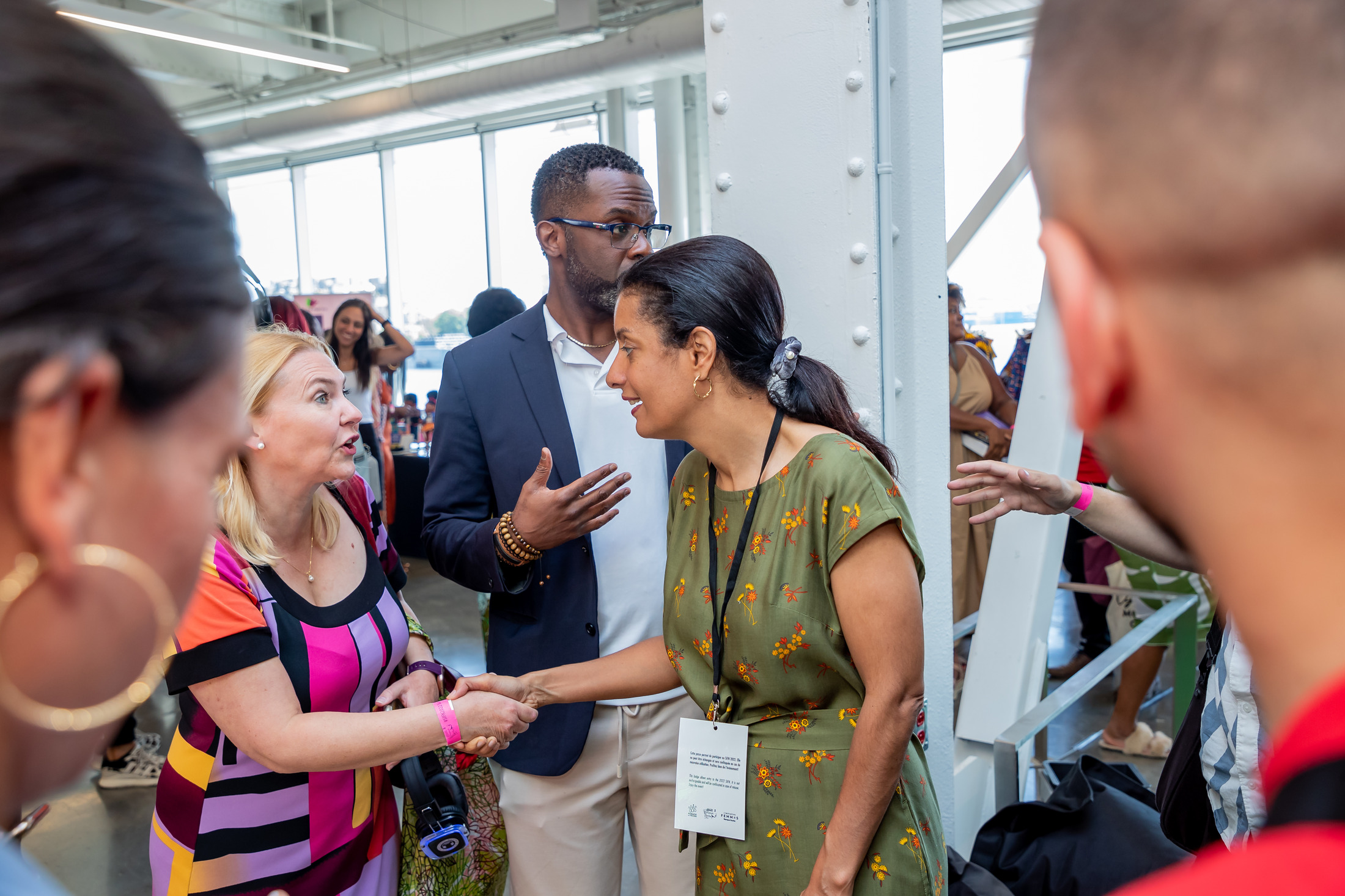 Guests greeting each other on the event floor