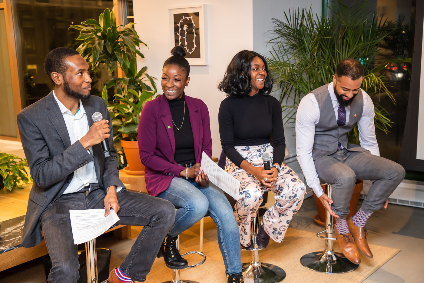 Panel discussion in a lounge setting at a live event